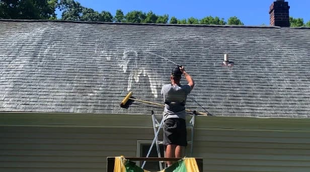 Before and after results of roof washing by Brecksville Power Washing in Brecksville