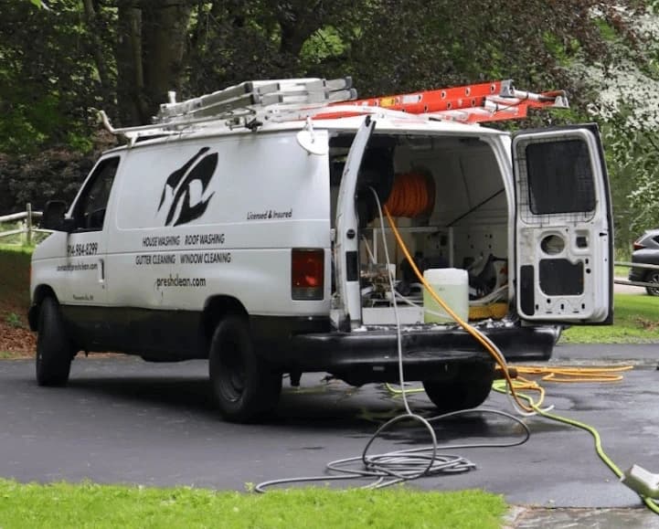 Brecksville Power Washing professionals cleaning commercial fleet in Brecksville